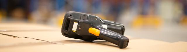 A barecode scanner in a warehouse for B2B companies